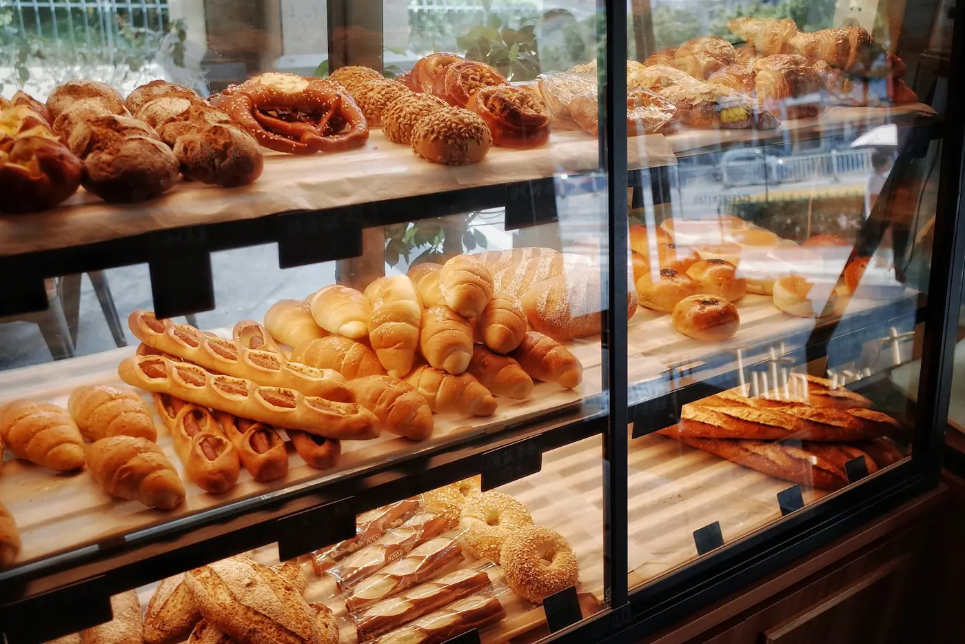 Bakery shelf with breads and pastries